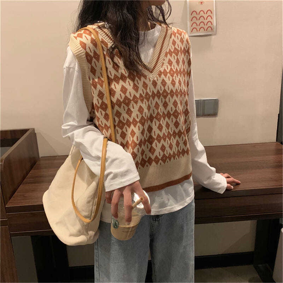 brown v neck sweater vest