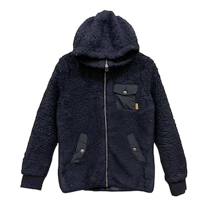May include: A black fleece jacket with a zip fastening and a hood. The jacket has a patch pocket on the left chest and two flap pockets on the lower front.
