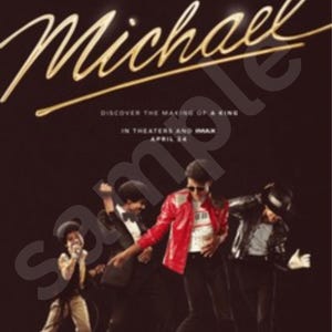 Op de afbeelding: Filmposter voor "Michael" met een groep performers in actieposes. De titel "Michael" staat in gouden letters. De poster bevat de tekst "Discover the Making of a King" en "In Theaters and IMAX April 24".