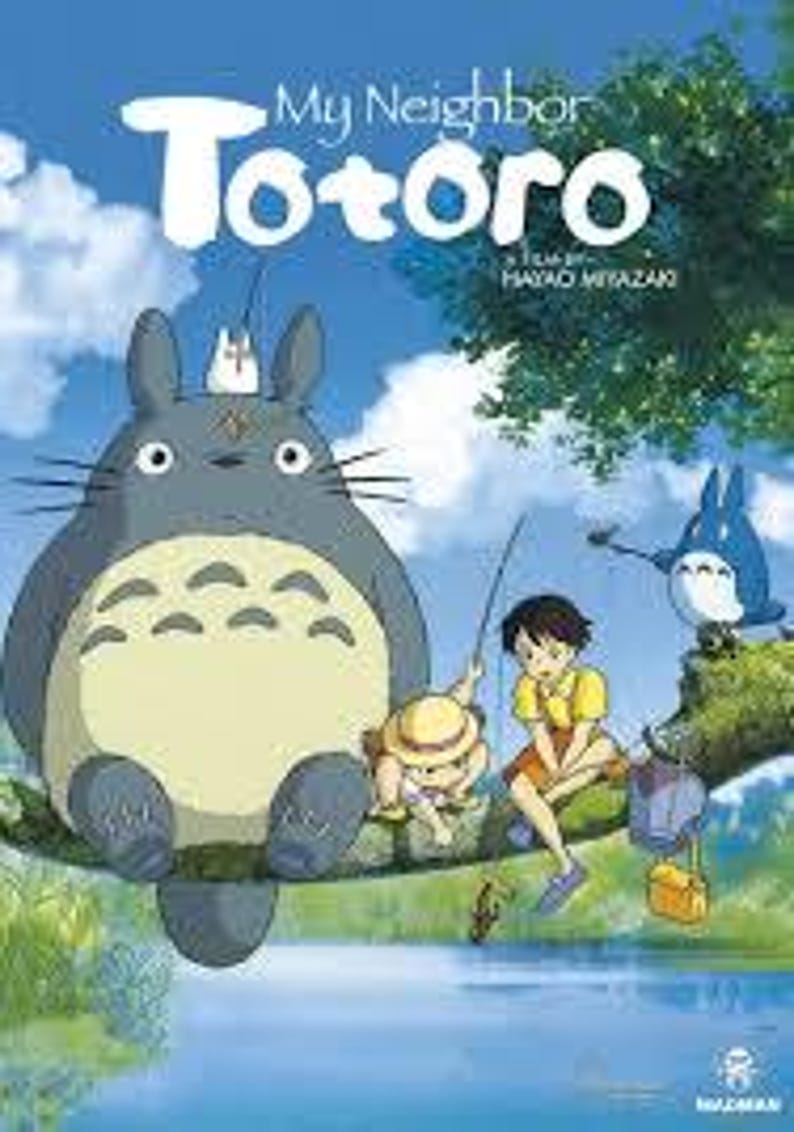 May include: A vibrant illustration from "My Neighbor Totoro" features the large, gray Totoro character with a smaller white creature on its head. A young girl and two other small creatures are on a tree branch, with the title text above.
