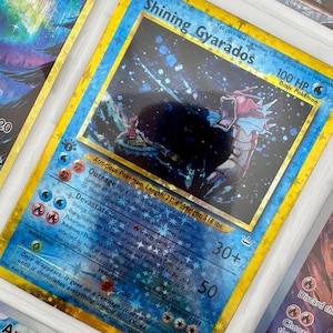 Gyarados brillants non officiels 65/64 Reliure photo en plastique Insertion de page dans la liste de souhaits Dramatisation de film holographique de remplacement LIRE LA DESCRIPTION