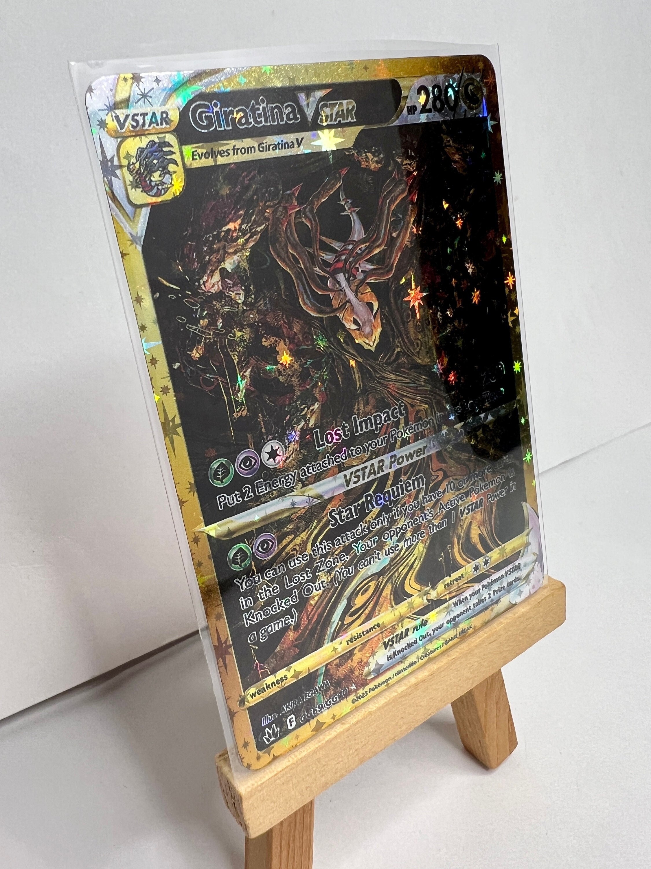 Off center Giratina but is it real? Got this at a trading day at a local  shop : r/PokemonTCG