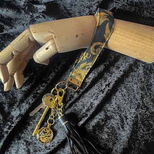 Pulsera de palabrotas para llaves con llavero a juego.