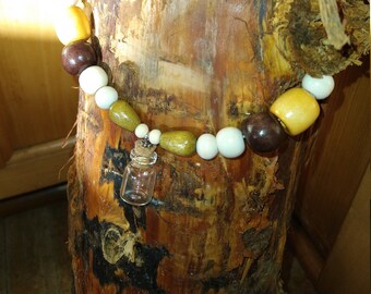 Perfume Bottle and Wooden Bead Necklace