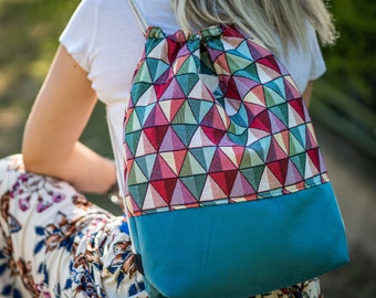 Triangle is a tote bag and a backpack purse.