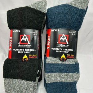 May include: Two pairs of thermal crew socks, one black with gray stripes and one blue with gray stripes. The socks are packaged with a label that says "Avalanche Outdoor Supply Company" and "Ultimate Thermal Crew Sock". The label also says "Fits Shoe Size: 6-12" and "All Day Warmth".