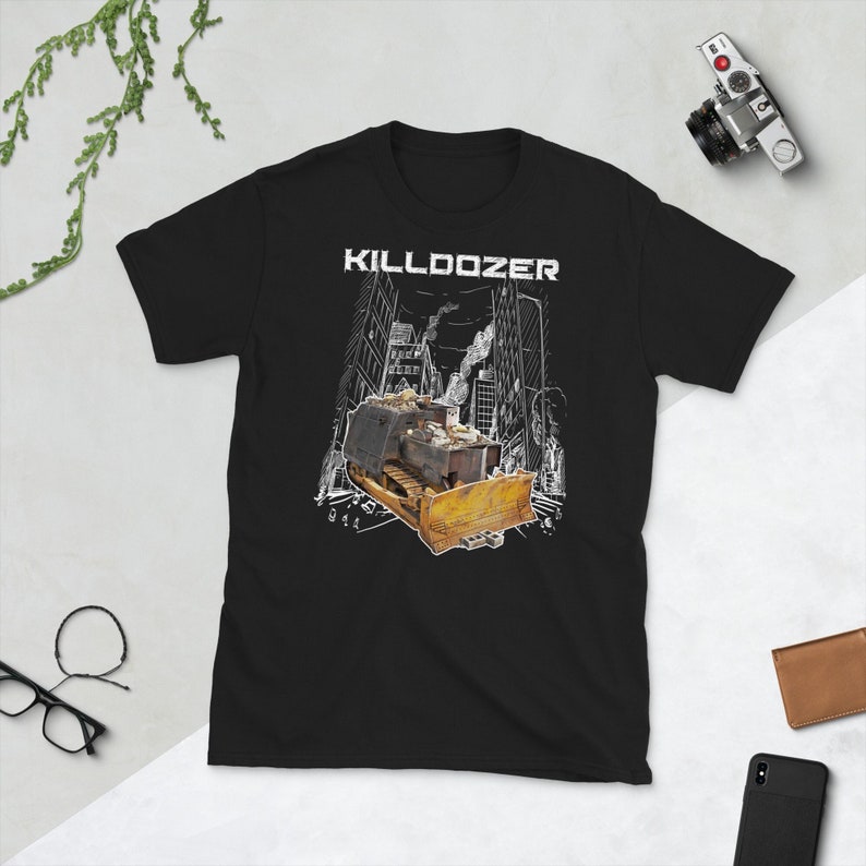 May include: Black t-shirt with a white graphic of a bulldozer in a city setting. The text "KILLDOZER" is above the bulldozer.