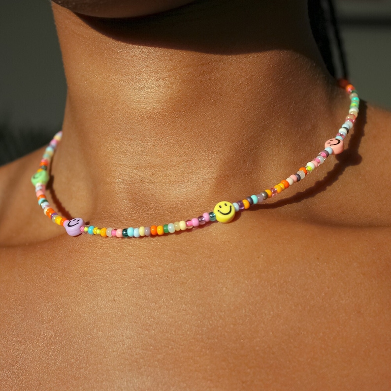 Colourful beaded necklace with 6 happy face beads