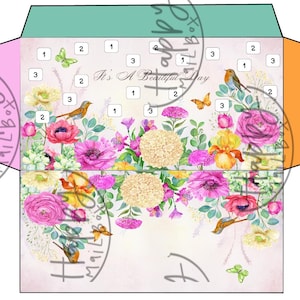 Op de afbeelding: Een decoratieve envelop met een bloemenontwerp in roze, turquoise en oranje tinten. De envelop is versierd met aquarelbloemen, vogels en vlinders, met de tekst "It's A Beautiful Day". Genummerde vakjes zijn inbegrepen.