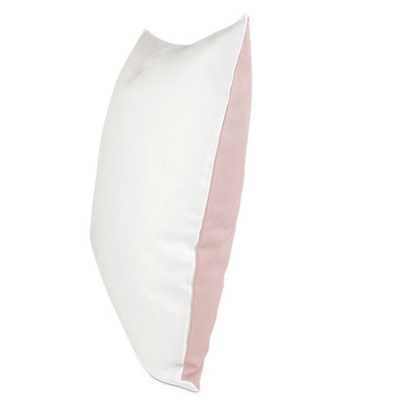 May include: A white pillow with a pink border. The pillow is made of a soft, comfortable material and is perfect for adding a touch of color to any room.