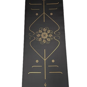 May include: Black yoga mat with gold lettering and a mandala design. The text reads "This is my moment" and "Calm & Chilled".