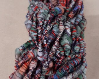 hand spun Art Yarn Super Coils Sunset over Fields Merino and Cotton.