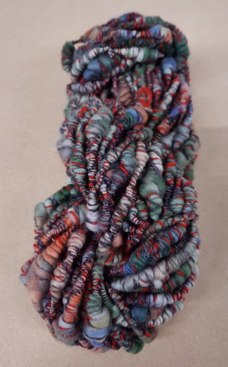 hand spun Art Yarn Super Coils Sunset over Fields Merino and Cotton.