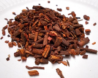 May include: A pile of dried, reddish-brown bark pieces, likely used for herbal remedies or teas.
