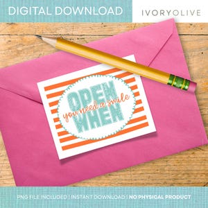 May include: A pink envelope with a card that reads "Open When you need a smile" and a pencil. The card has orange and white stripes. The text "DIGITAL DOWNLOAD" and "IVORYOLIVE" are at the top.