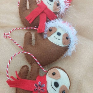 Handmade felt Christmas decoration featuring a sloth