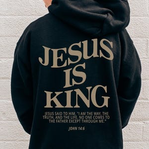 Sudadera con capucha para niños Jesús es Rey Camiseta Jesús es Rey Amor como Jesús Sudadera con capucha cristiana Jesús te ama Ropa de Jesús Nombres de Jesús Merchandising cristiano