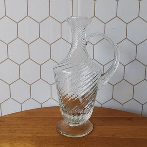 Old glass water jug, wine jug, bottle