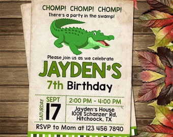 May include: Green and white birthday invitation with a cartoon alligator. The invitation says "CHOMP! CHOMP! CHOMP! There's a party in the swamp!" and "Please join us as we celebrate JAYDEN'S 7th Birthday". The invitation also includes the date, time, and location of the party.