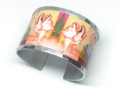 Aluminum bracelet inspired by the dancer at the pole by Fernando Botero. Personalized text