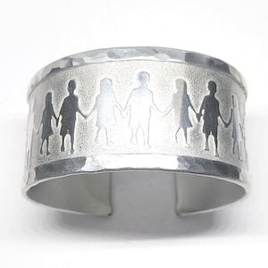 Aluminum Bracelet - with children holding hands, 30 mm wide. Personalized text inside