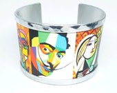 Dalí style designs. Bracelet made with aluminum and personalized text.  Upcycled Jewelry - food can jewelry