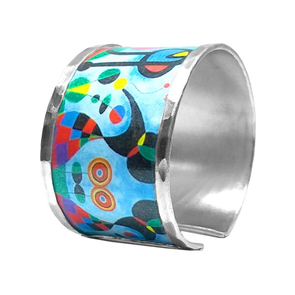 Bracelet - bangle  inspired in Joan Miró, made with aluminum. Personalized text on the inside.