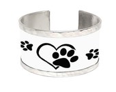 Dog paw print bracelet made with recycled cans with personalized text.  Upcycled Jewelry - food can jewelry