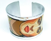 Bracelet - bangle  inspired in Frida Kahlo pop art, made with aluminum recycled cans. Personalized text on the inside.