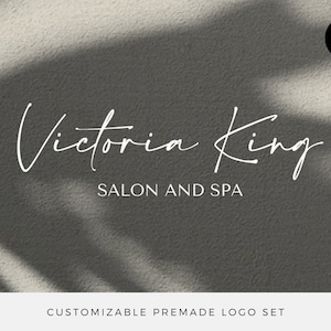 May include: A customisable premade logo set for a salon and spa, featuring the text "Victoria King Salon and Spa" in a white cursive font on a grey background with a shadow effect. The text "Ready in 2 Days" is in a white circle with a black outline.