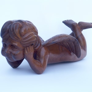 Hand-Carved Suar Wood Cherub Figurine: Balinese Art