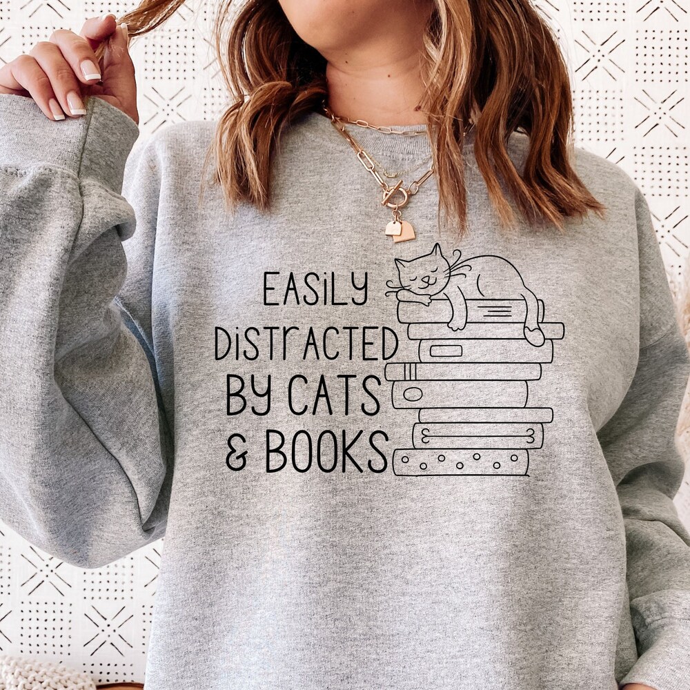 Easily Distracted By Cats And Books Sweatshirt, Bookish Gift, Funny Sayings Sweatshirt, Cat Sweatshirt, Cat Lover Gift, Book Lover Gift Hoodiegen