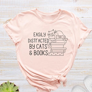 Easily Distracted By Cats And Books Shirt, Book Lover Gift, Funny Cat Shirt, Cat Lover Shirt, Cat Lover Gift, Reader T-Shirt, Cats and Books