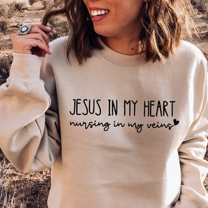 Jesus In My Heart Nursing In My Veins Sweatshirt, Nursing School Shirt, Nursing Student Gift, Nurse Hoodie, Jesus Shirt, Gift For Nurses
