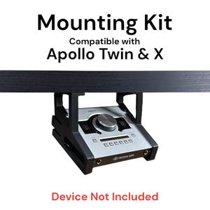 May include: Black mounting kit for an audio interface. The kit is compatible with Universal Audio Apollo Twin and Apollo X interfaces. The text "Device Not Included" is printed below the image.