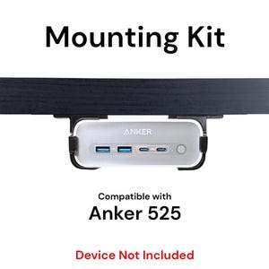 May include: A black mounting kit for the Anker 525 device. The kit includes a bracket that attaches to a desk or table and a holder for the device. The device is not included. "Mounting Kit" and "Compatible with Anker 525" are written in black text on a white background. "Device Not Included" is written in red text on a white background.
