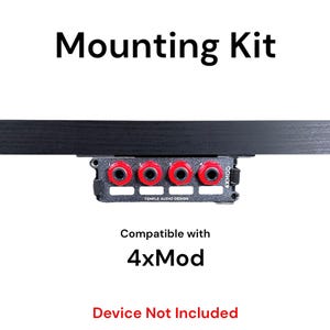 May include: Black mounting kit for a 4xMod pedal. The kit includes a black metal plate with four red jacks and the text "4xMod" printed on it. The text "Compatible with 4xMod" and "Device Not Included" are also printed below the plate.