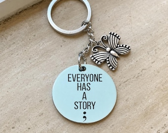 Everyone Has A Story Keychain