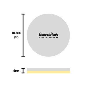 Size Diagram of circular wool felt and cork coasters. Each coaster has a diameter of 4 inches (10.2cm) and a thickness of 6mm.
