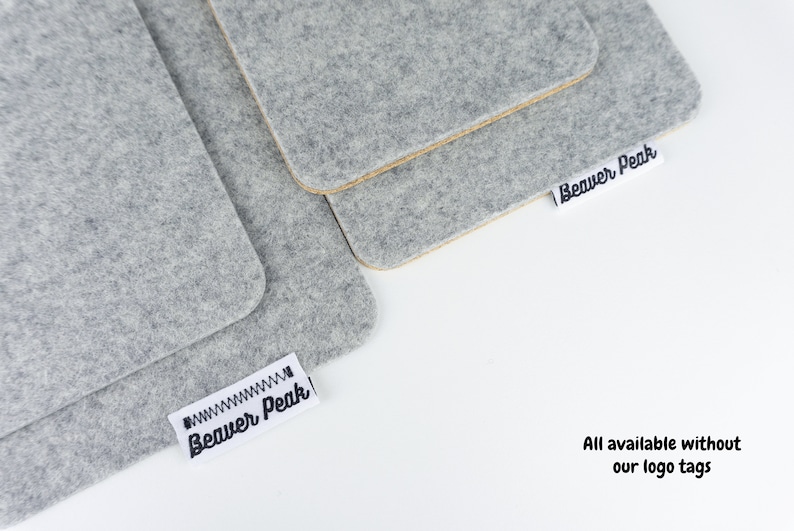 Our phone mats shown with and without logo tags on both wool plus cork and wool only options.