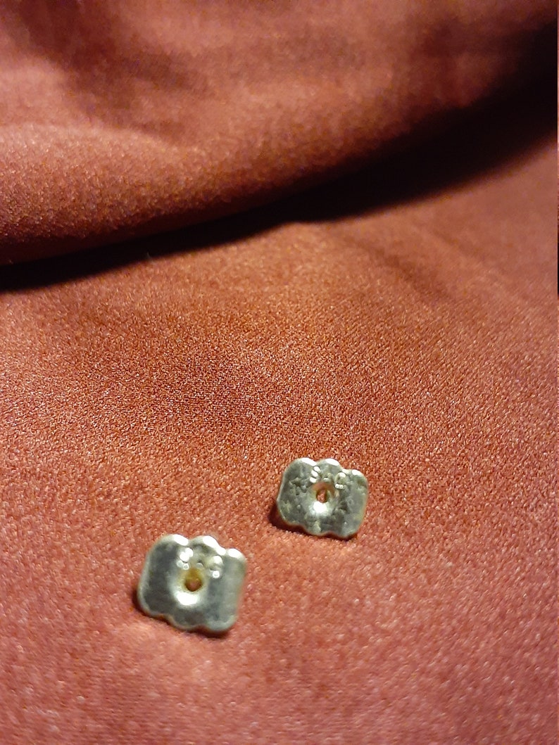 Avon teardrop earrings with enclosed pearl