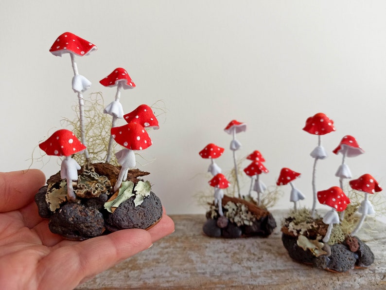 Mushroom decor Amanita, toadstools. Miniature composition of Red mushrooms.