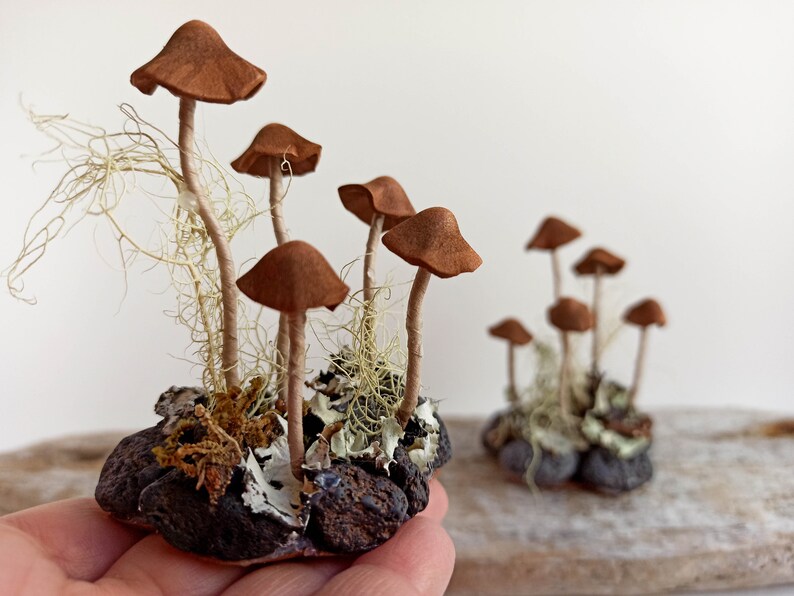 Mushroom decor Amanita, toadstools. Miniature composition of Brown mushrooms.