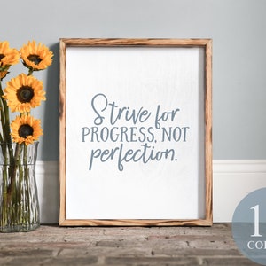 Esfuérzate por el progreso, no por la perfección, el progreso no la perfección, la cita alentadora, la señal inspiradora, el regalo motivacional,