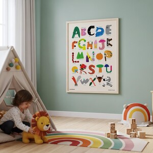 May include: A rectangular wall poster featuring a colorful alphabet illustration with each letter represented by a unique object or animal, including a green alligator for A, a pink butterfly for B, and a zebra for Z, all set on a cream background.