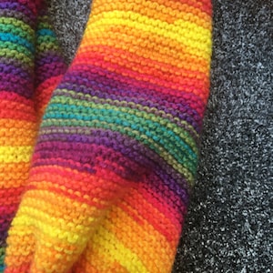 Hand Knitted Rainbow Scarf With Pom Poms