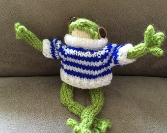 Hand knitted frog in a blue and white striped jumper