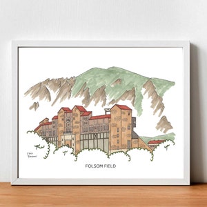 May include: A hand-drawn illustration of Folsom Field, a football stadium in Boulder, Colorado. The stadium is depicted in brown and red with a green mountain range in the background. The text "Folsom Field" is written below the stadium.