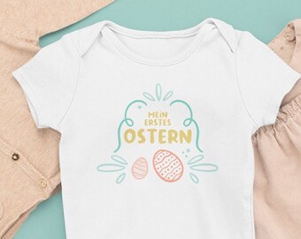 Mein erstes Ostern - Baby Body | Viele Größen und Farben | Baby Statement Body mit Spruch als Ostergeschenk | Strampler | Unisex Babybody