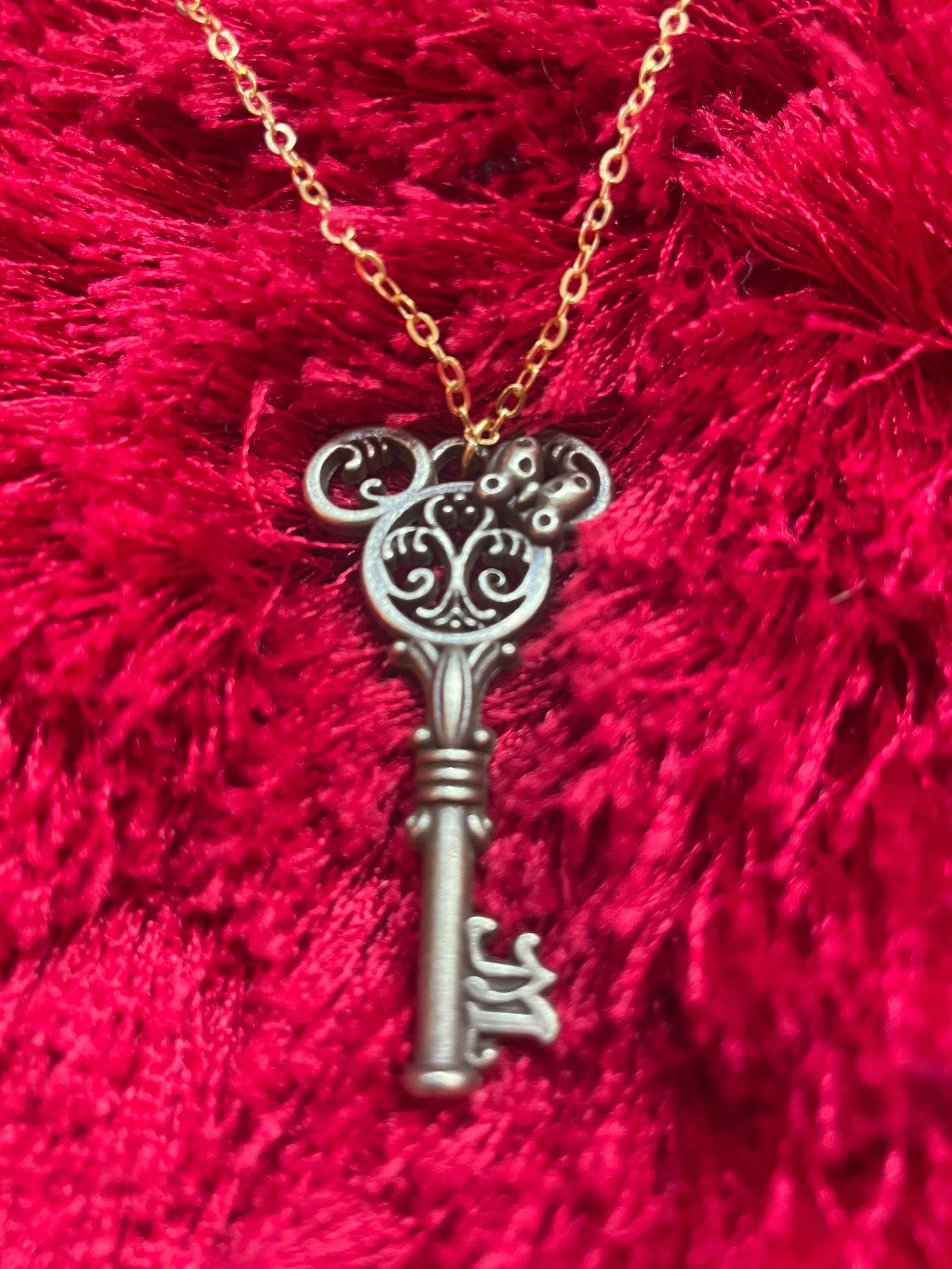 Character inspired necklaces including Mickey holds the key | Etsy